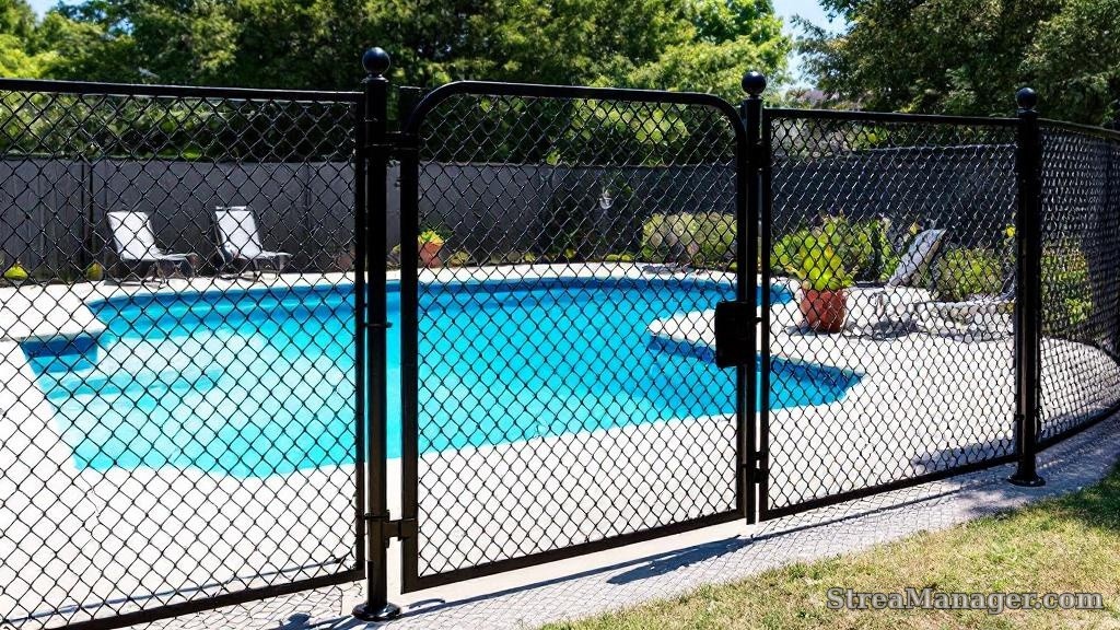 6-foot black vinyl chain link pool safety fence with self-closing gate