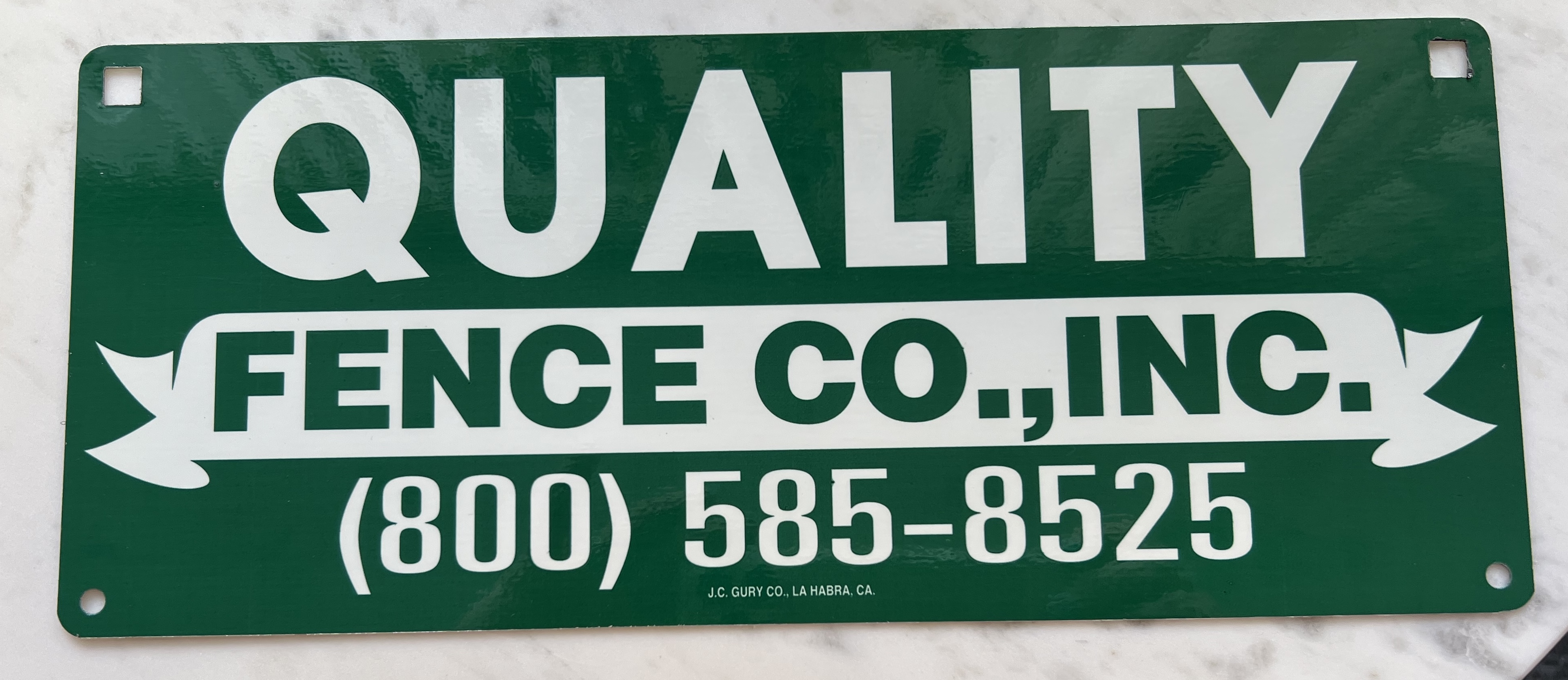 green rounded rectangle Fence Sign