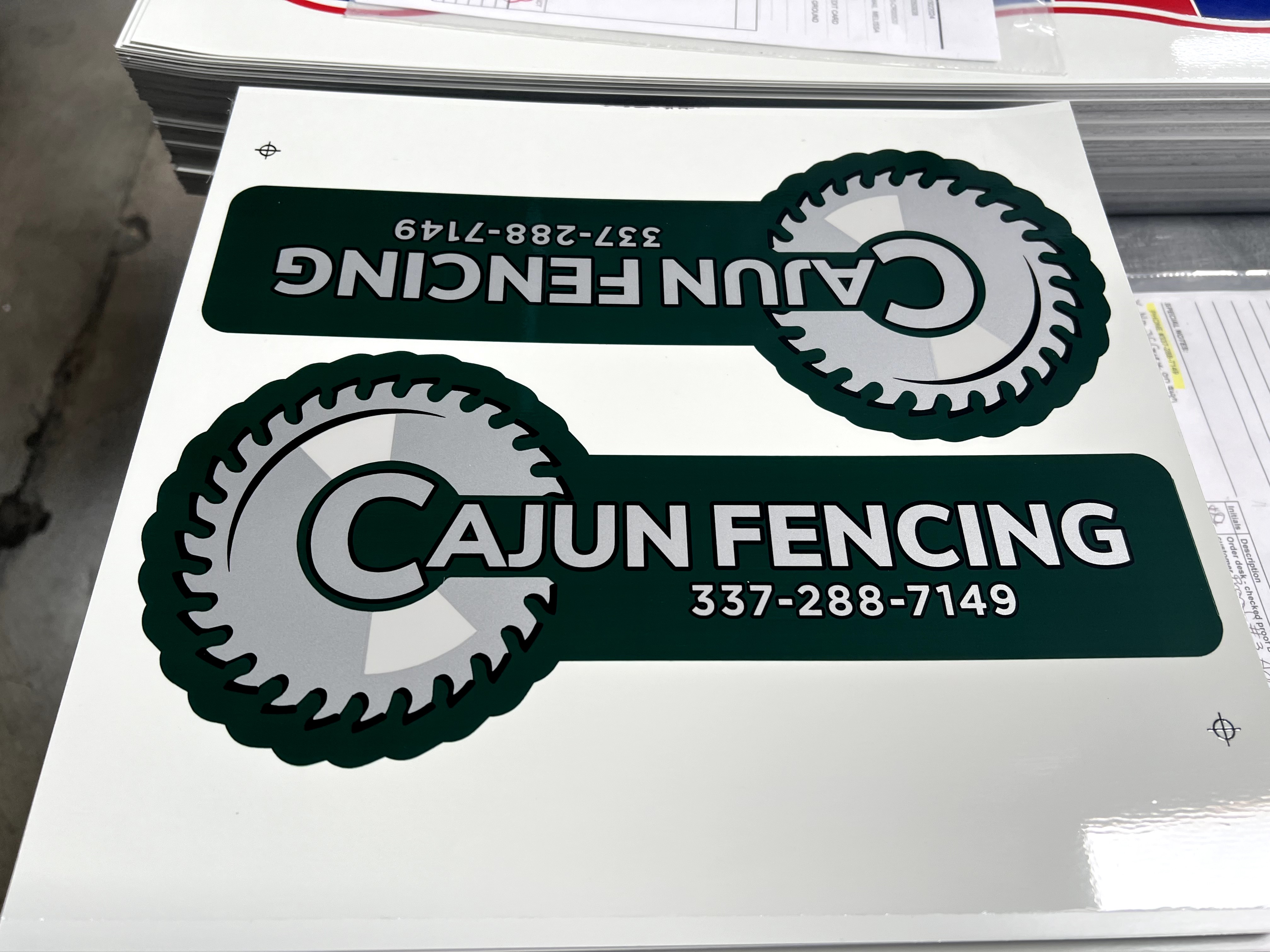 Custom green and silver rectangle sign for fence businesses