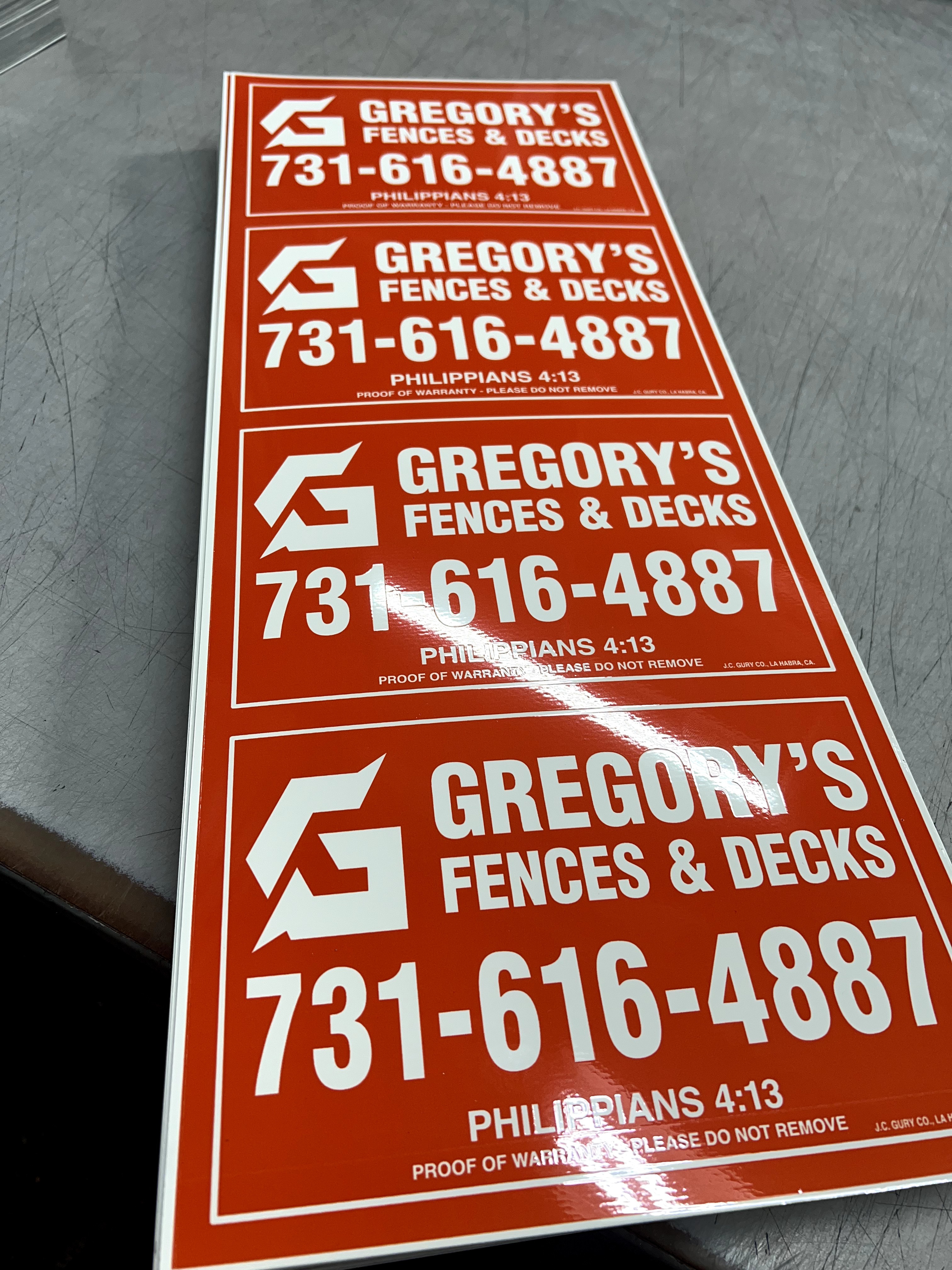 Custom red and white rectangle sign for fence businesses