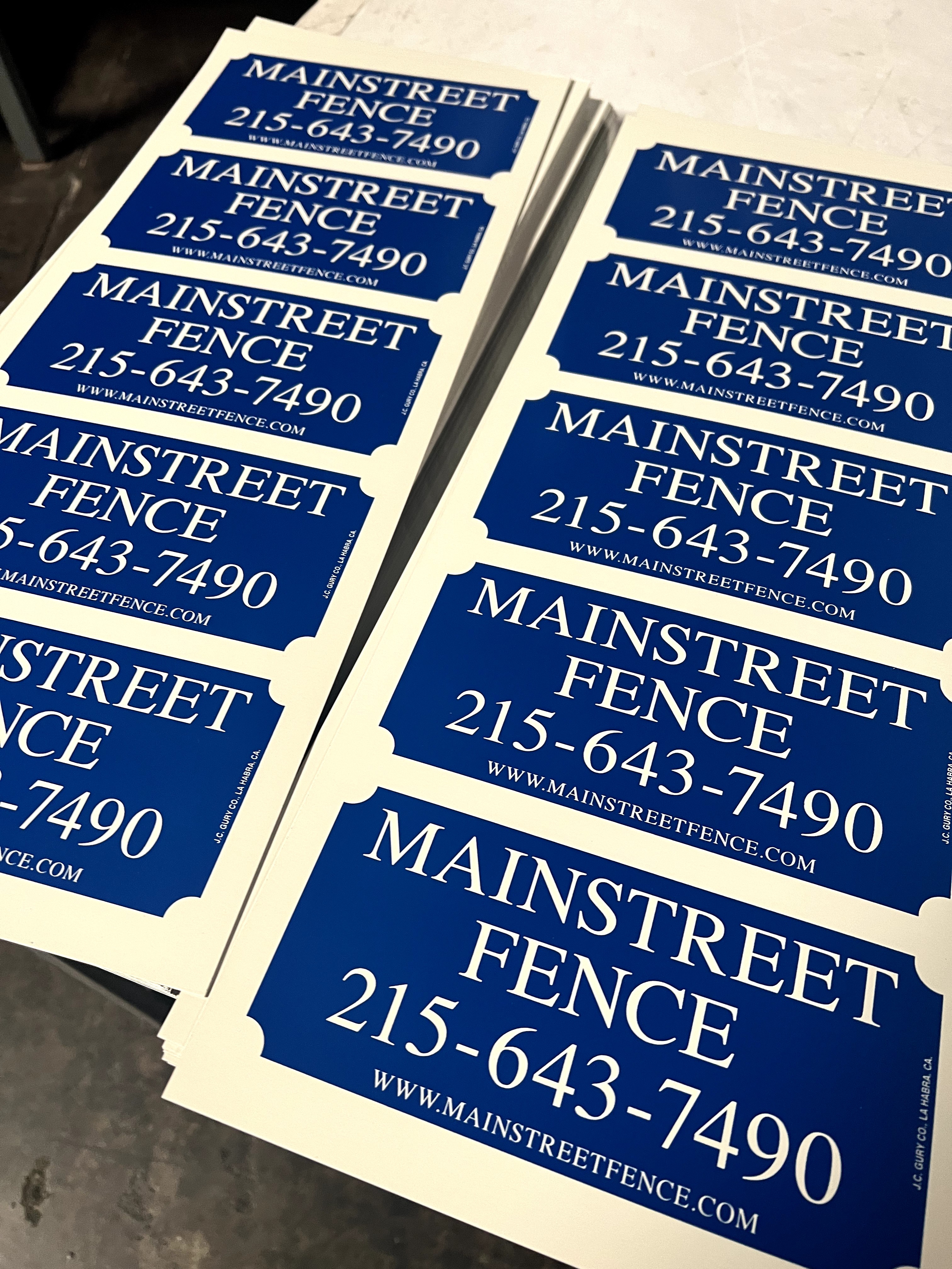 Custom blue and white rectangle sign for fence businesses