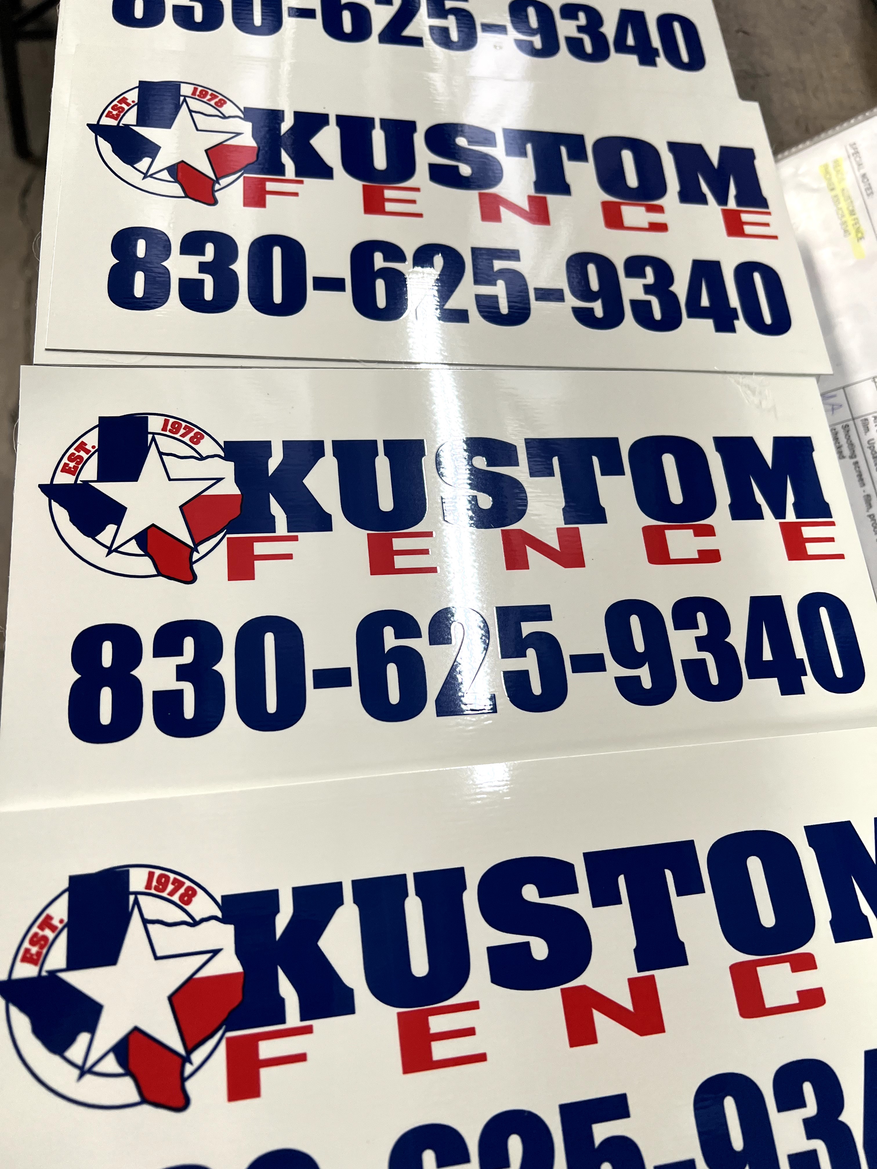 Custom blue and red rectangle sign for fence businesses