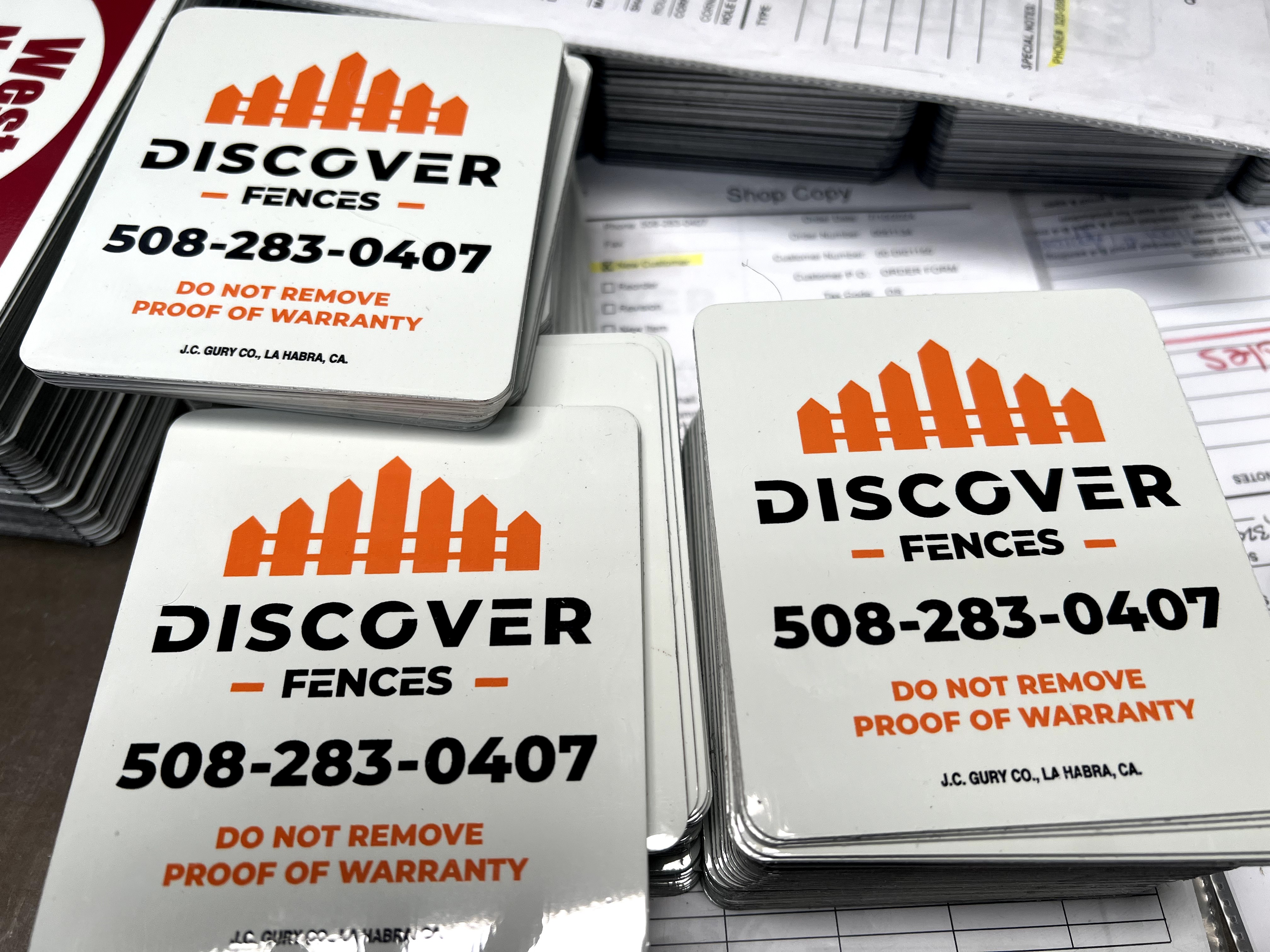 Custom black and red rounded rectangle sign for fence businesses