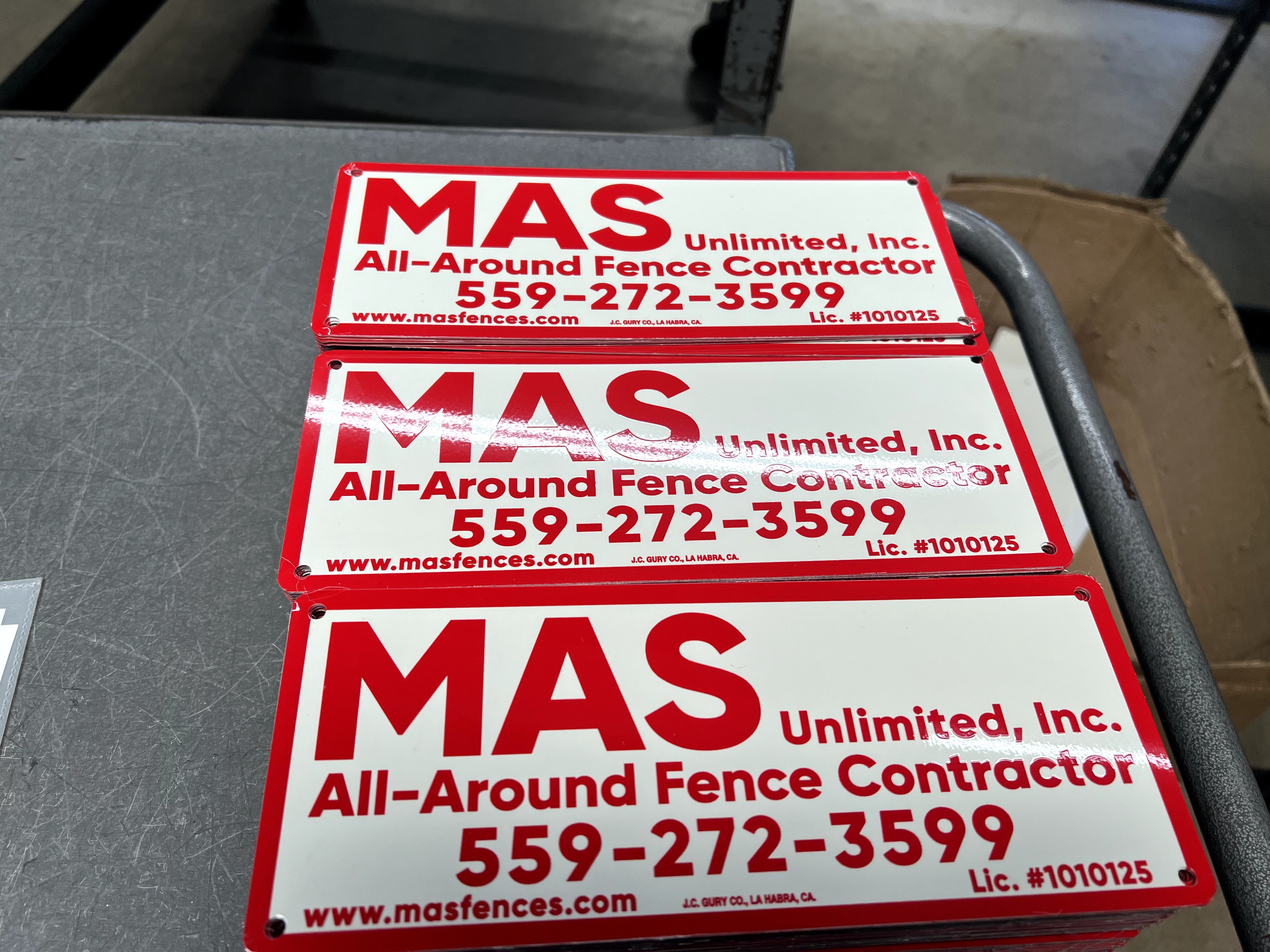 Custom crimson and white rectangle sign for fence businesses