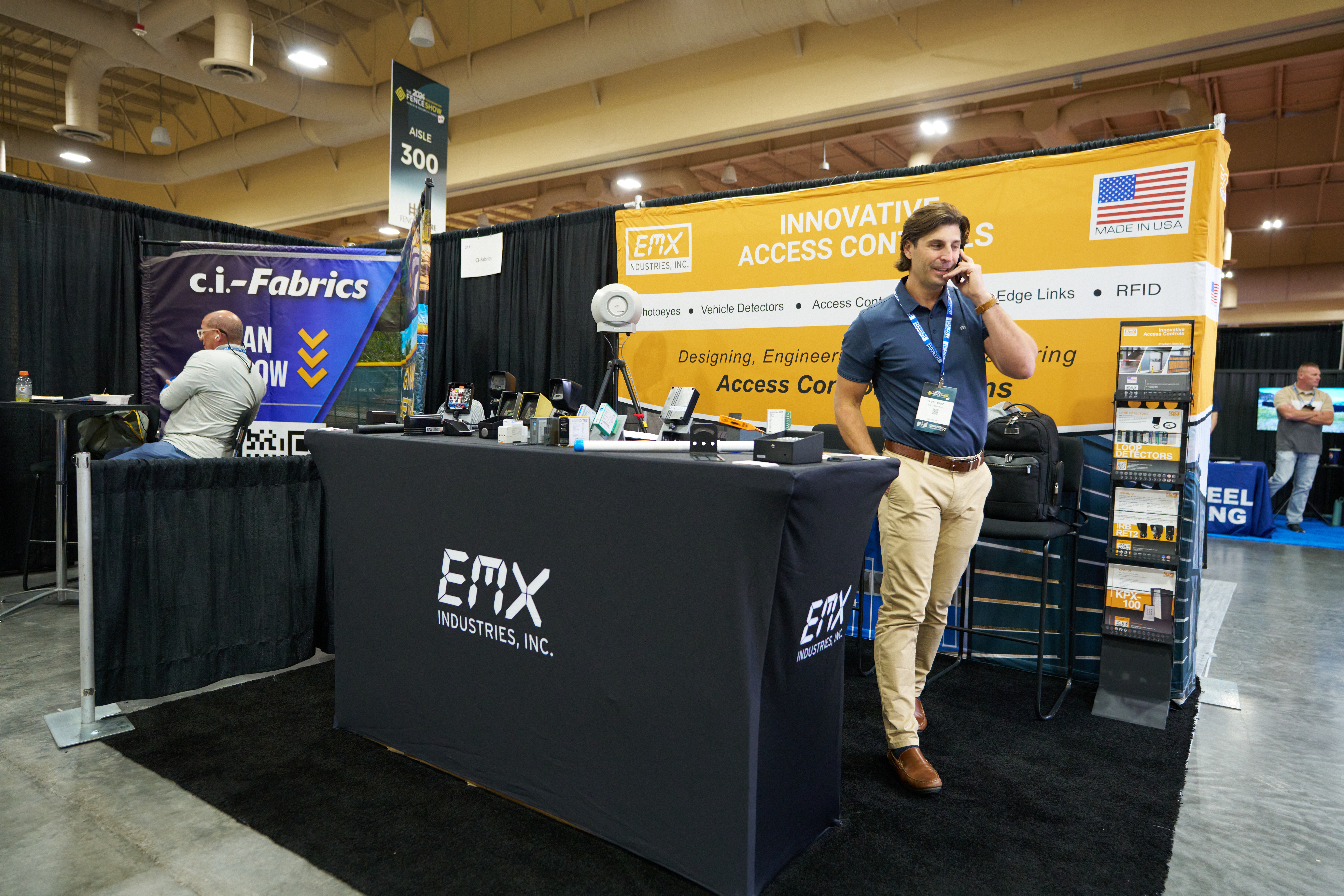 EMX Industries trade show booth showcasing access control sensors, gates, and security solutions for industrial applications.